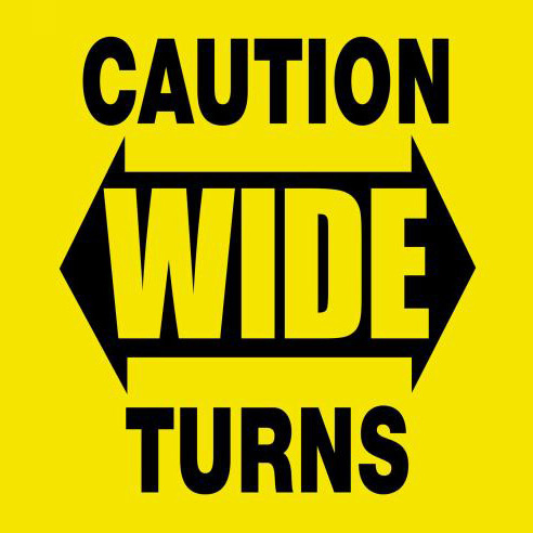 CAUTION WIDE TURNS